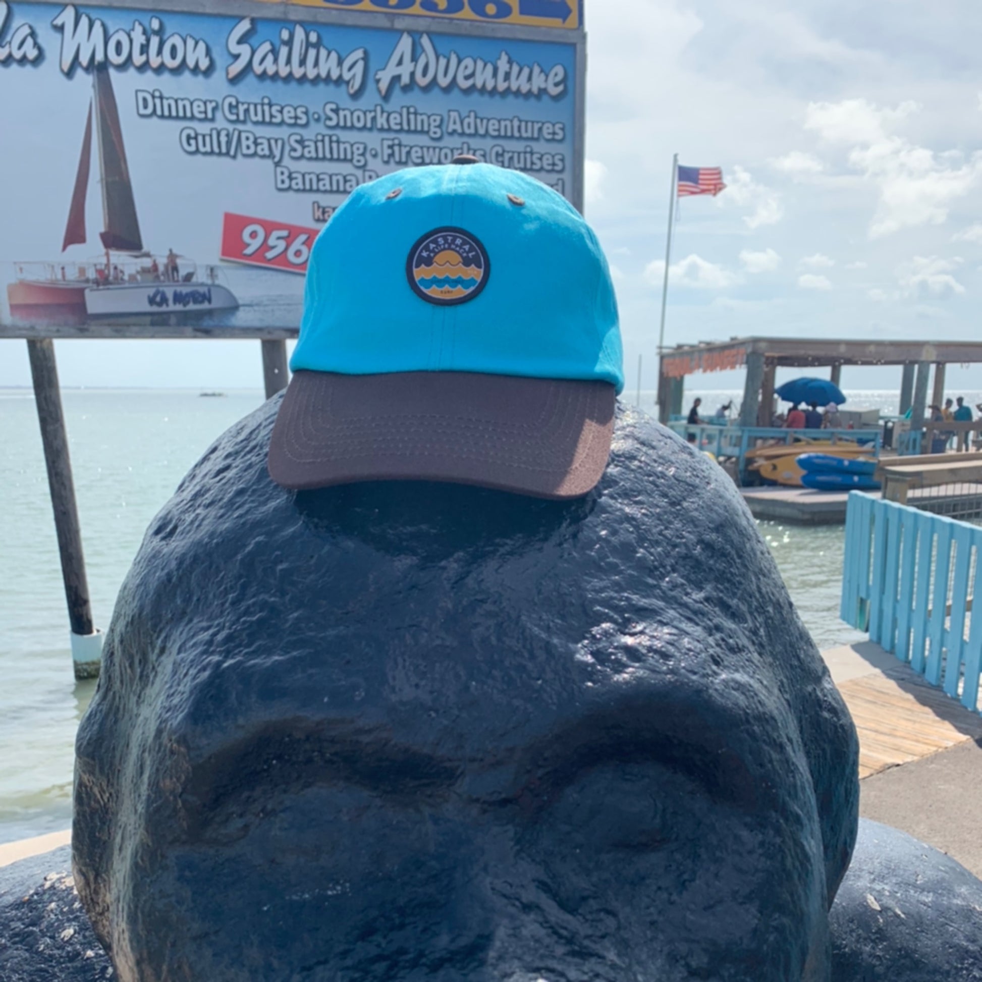 Coastal Vibes Dad Hat from Kastral Outdoor Brand on ape near beach