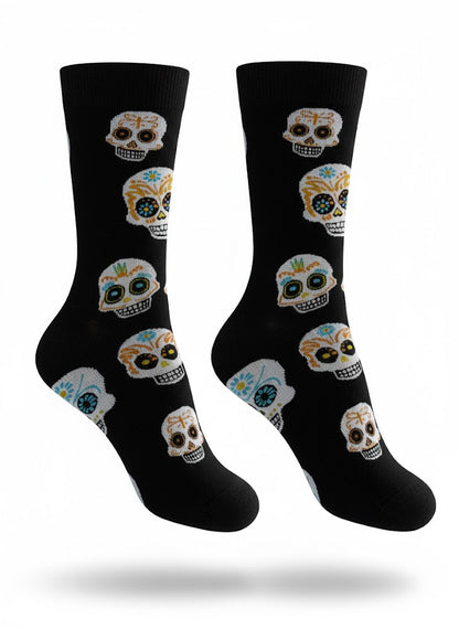 Black socks with colorful skull designs on a white background