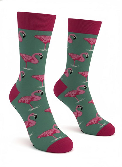 Green socks with pink flamingo pattern on a white background