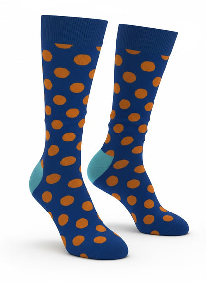 Blue socks with orange polka dots on a white background