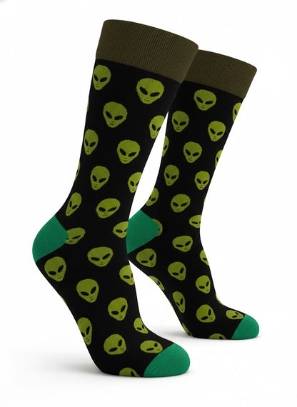 Pair of socks with alien pattern on a white background